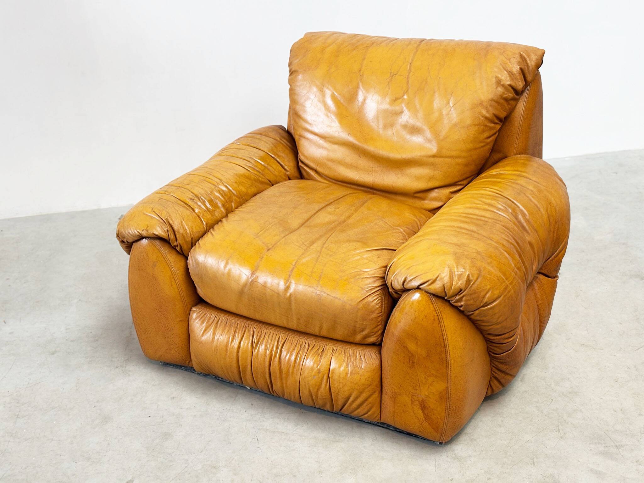 Set of two Italian cognac leather lounge chairs