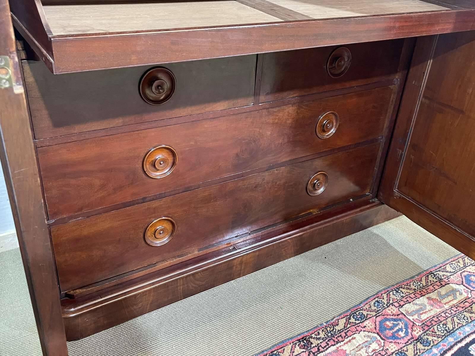 19th-century Victorian English bedroom wardrobe in mahogany.