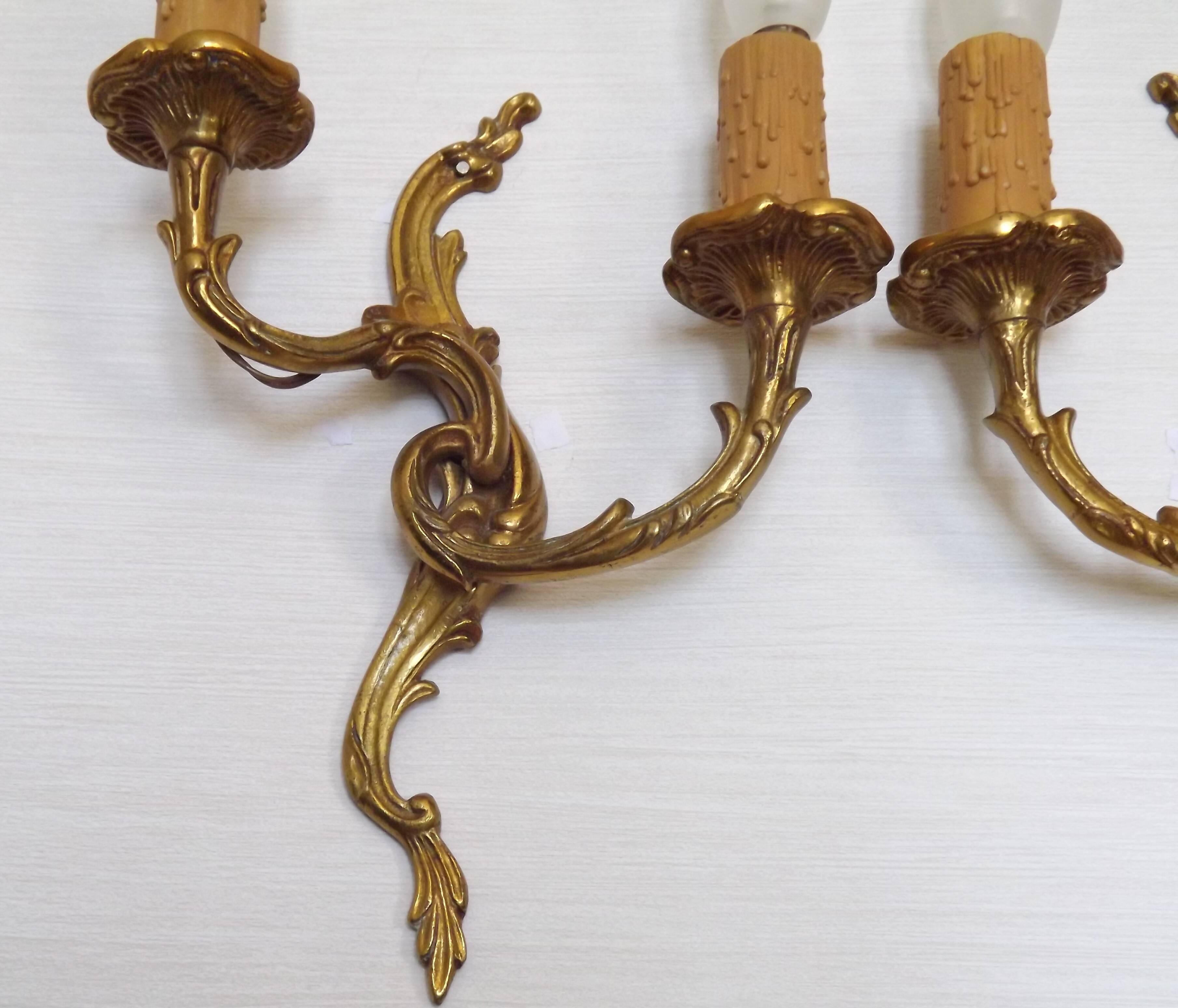 Pair of Elegant French Bronze Opposite Acanthus Leaf Double Wall Sconces