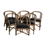 Lot of rattan chairs sitting imitation leather