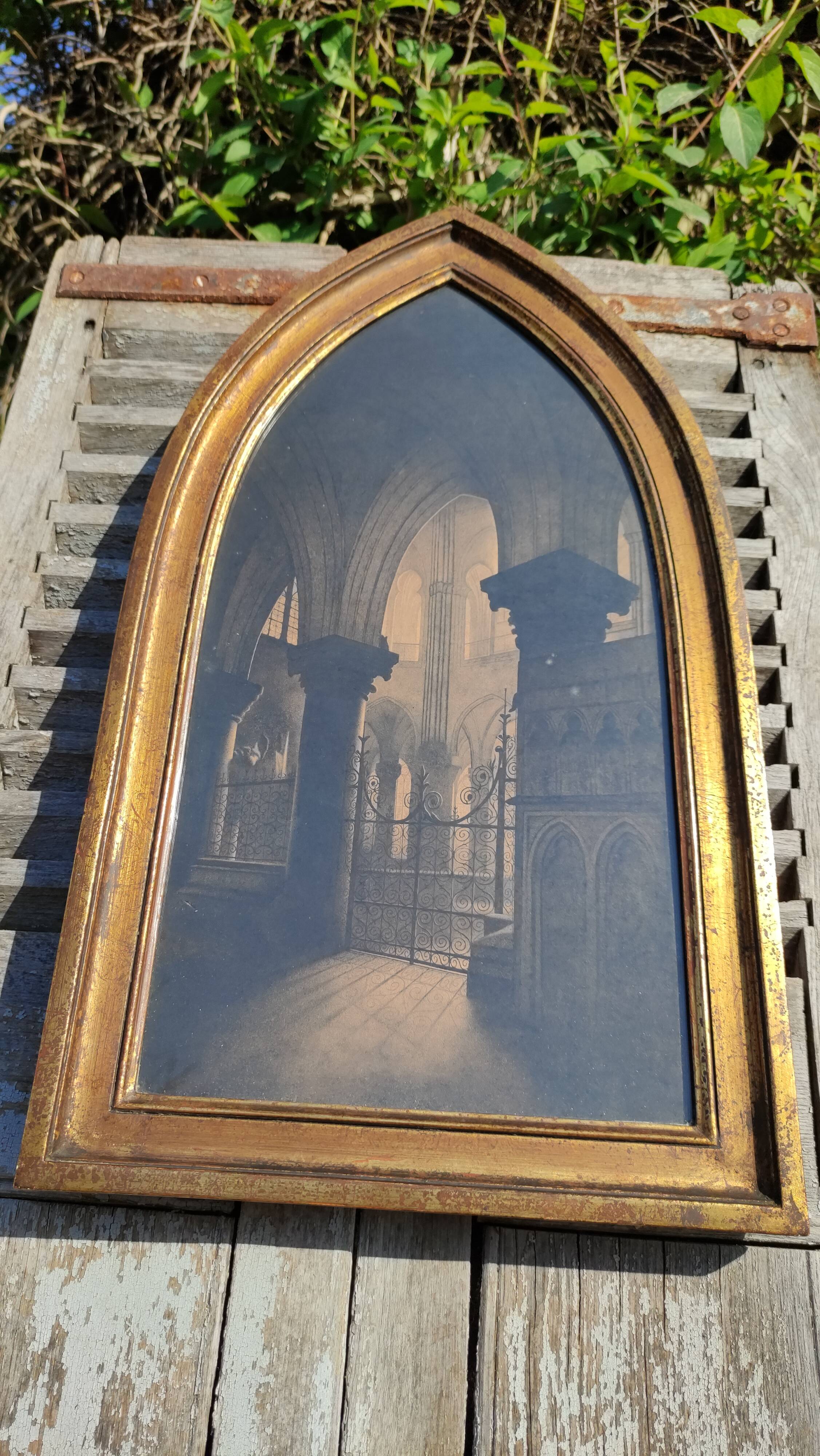 Large old wall frame in gilded wood