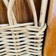 Vintage storage chest in wood and woven rattan