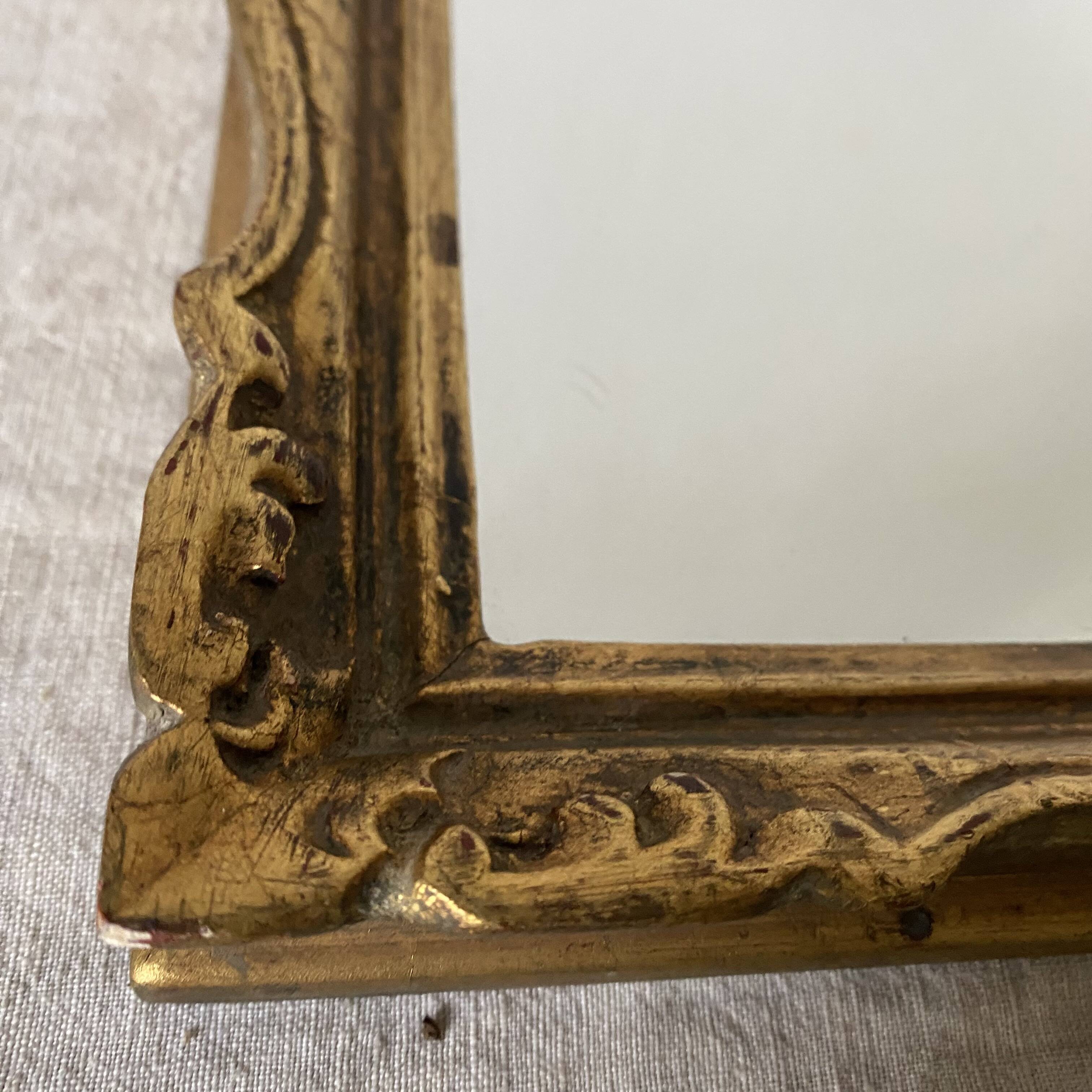 Small molded gilded mirror