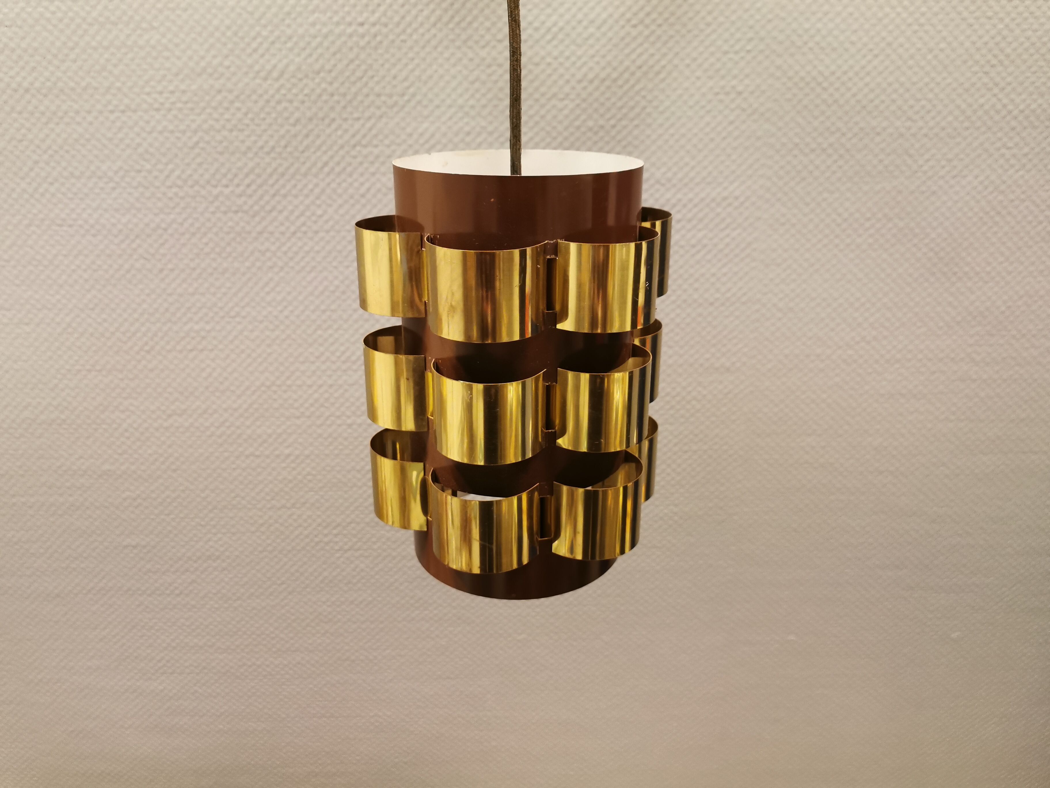 Danish hanging lamp from the 70s, in thin cut metal.