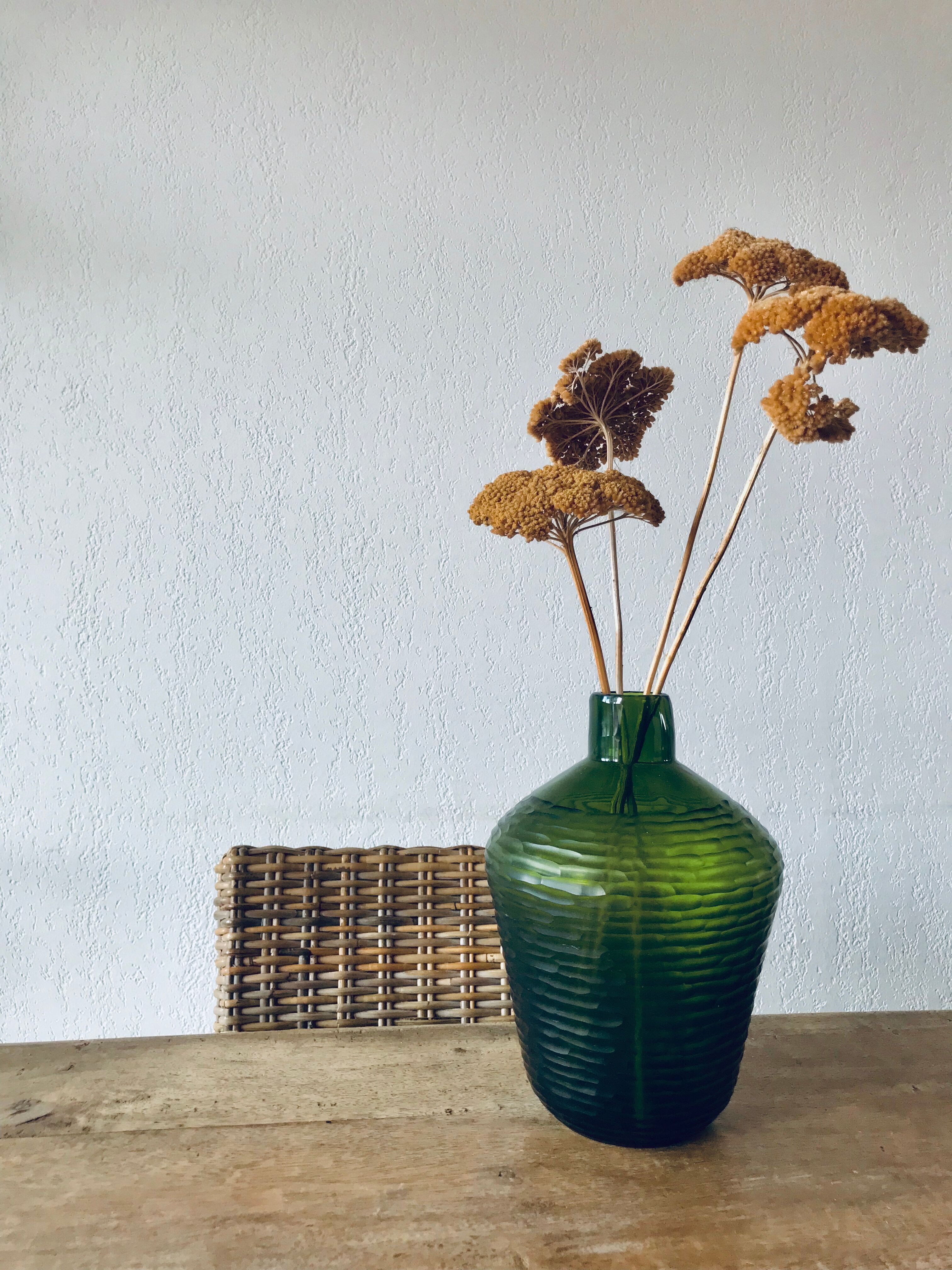 Green carved glass vase