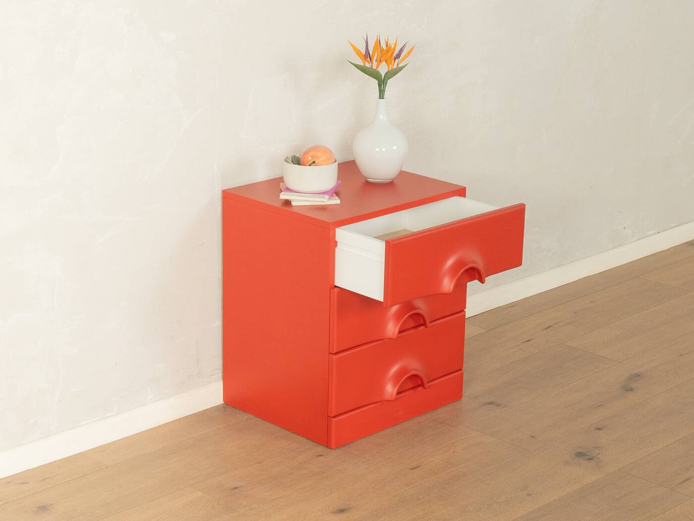 Red chest of drawers by Schönbuch in characteristic Space Age design from the 1970s