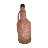 Bottle in his suit of wicker