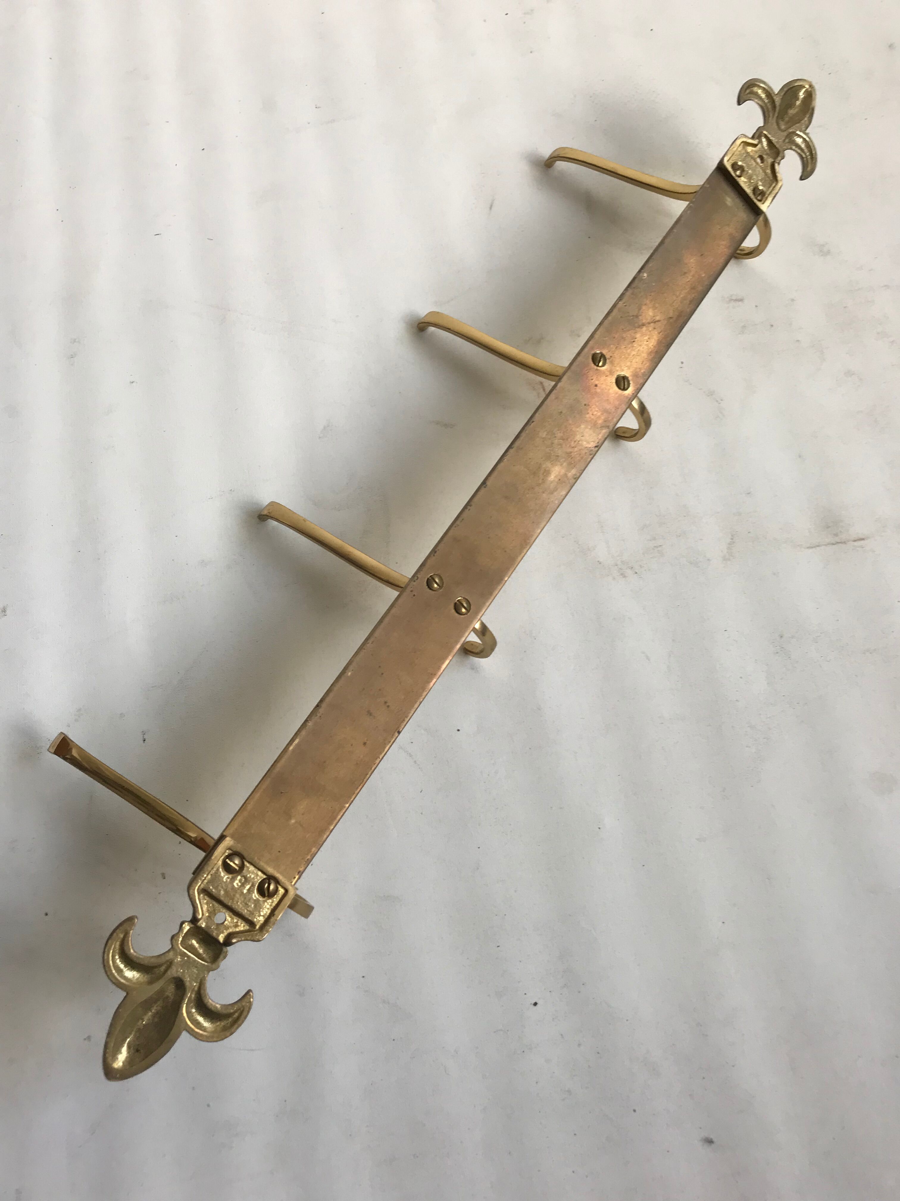 Golden brass wall rack