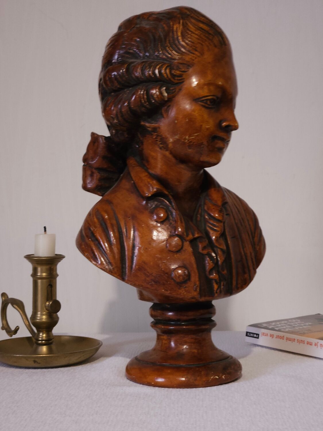 Bust of a young man in antique plaster.