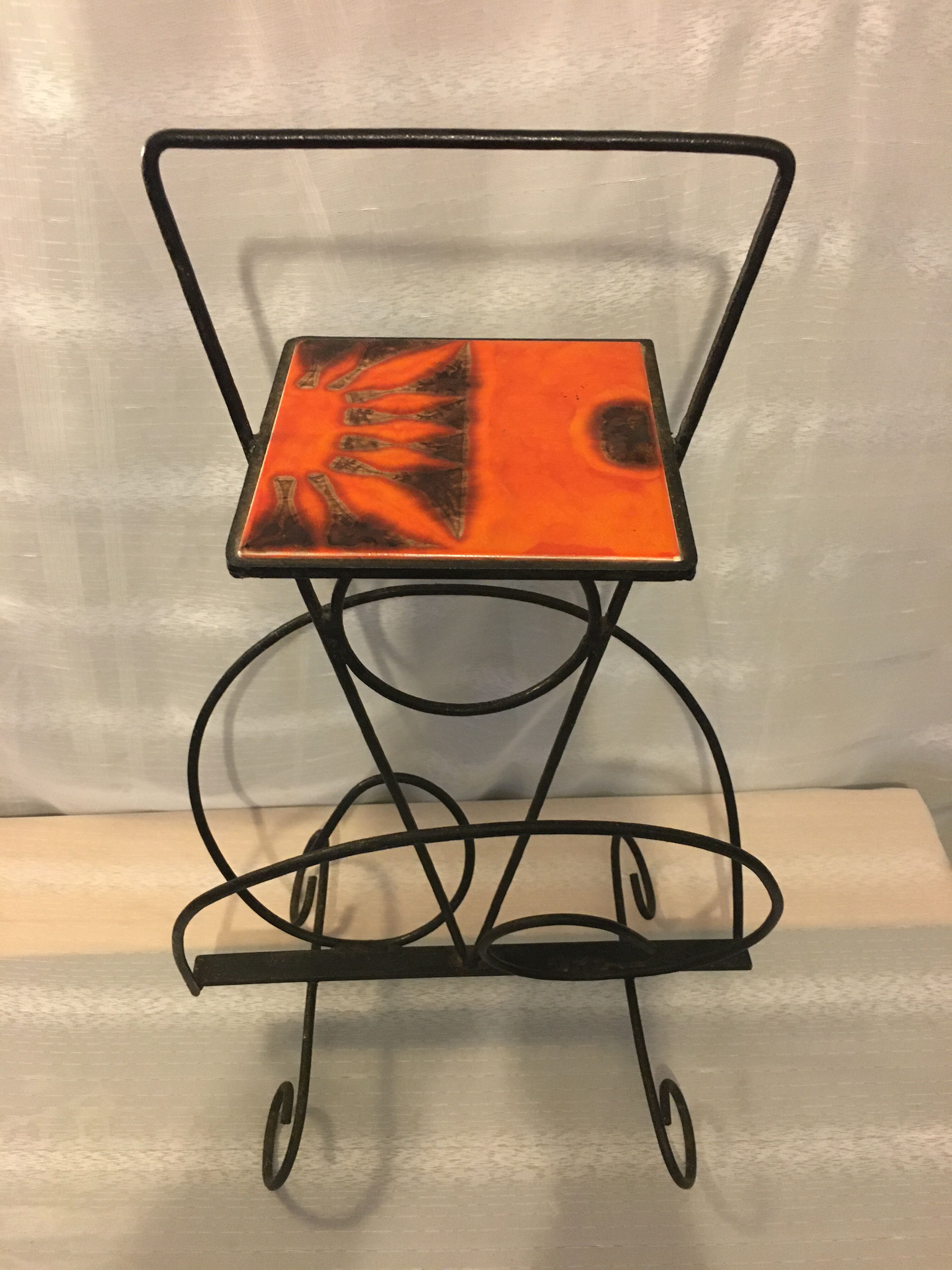 Wrought iron newspaper holder