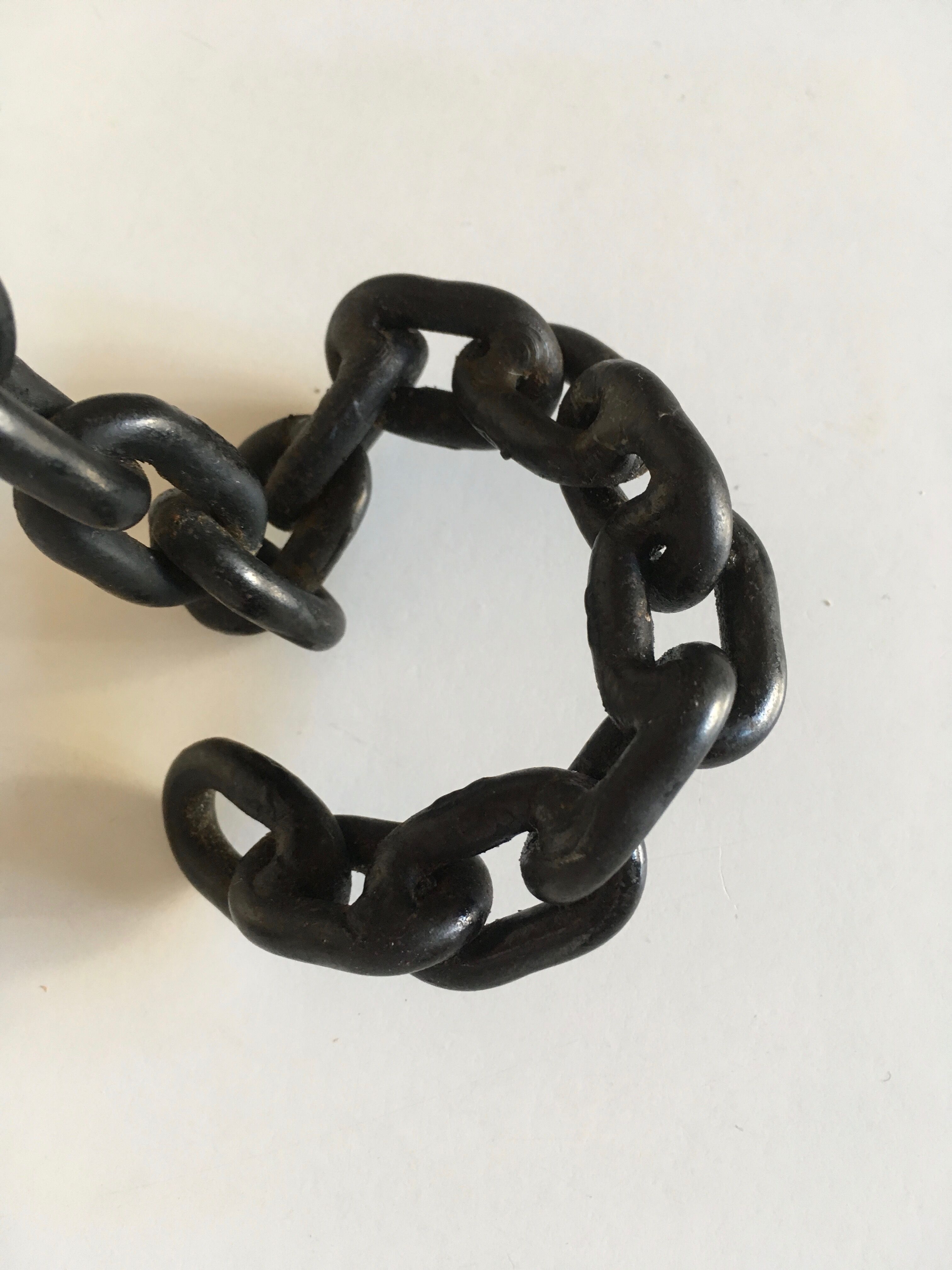 Candlestick with iron link chain and bronze cup