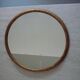 Old gilded wood oval mirror
