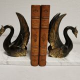 Pair of ancient zoomorphic bookends, swan statues