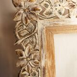Carved wooden frame. carved wooden frame with floral motifs.