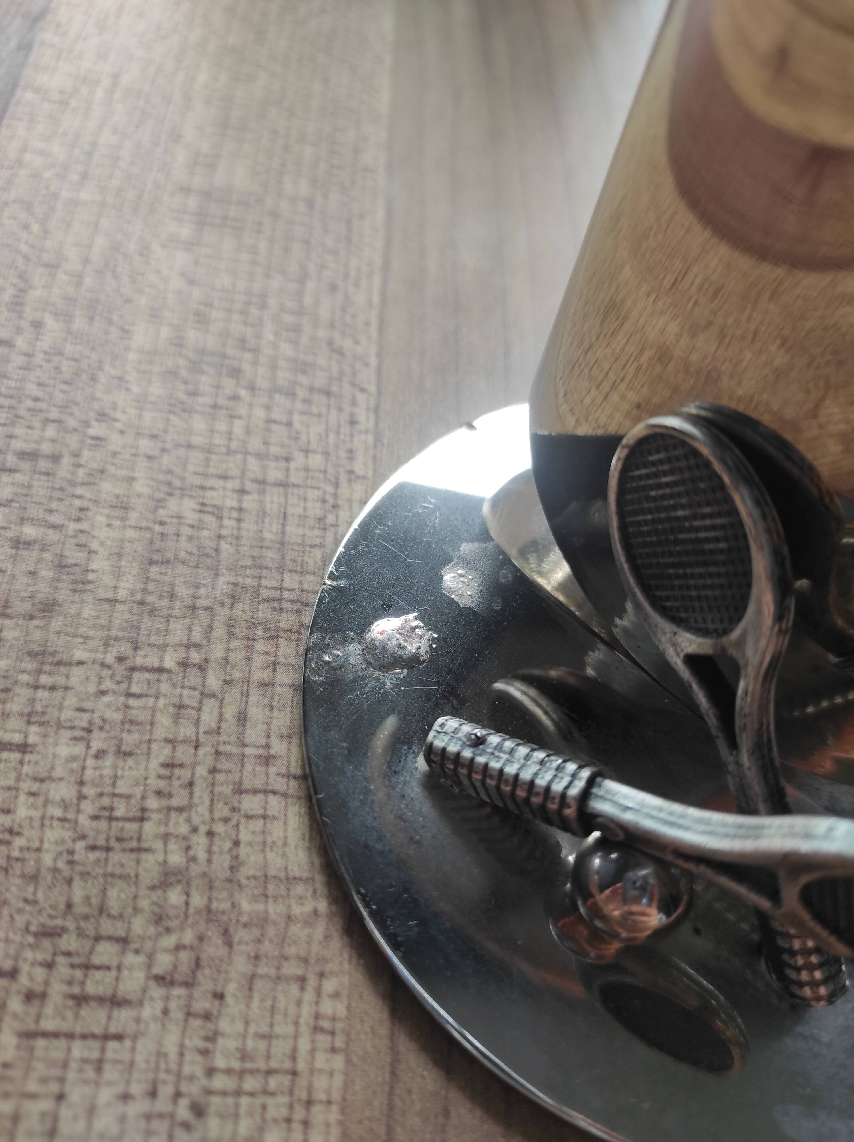 Vintage silver metal pencil holder decorated with tennis rackets