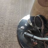 Vintage silver metal pencil holder decorated with tennis rackets