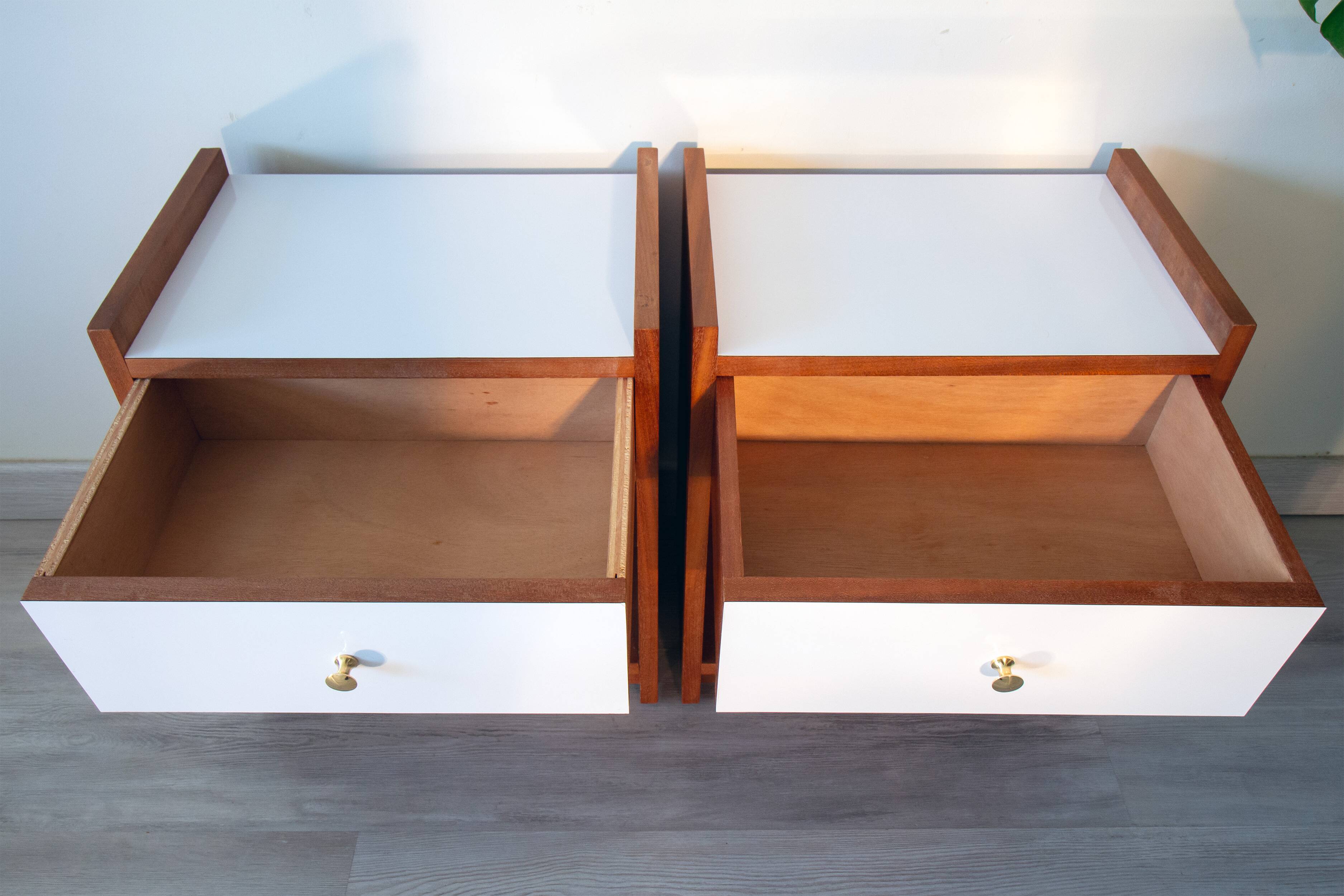 Pair of bedside tables, mahogany, white laminate and brass, 1970