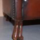 Victorian leather canapé and armchair, barrel back, circa 1860, restored.