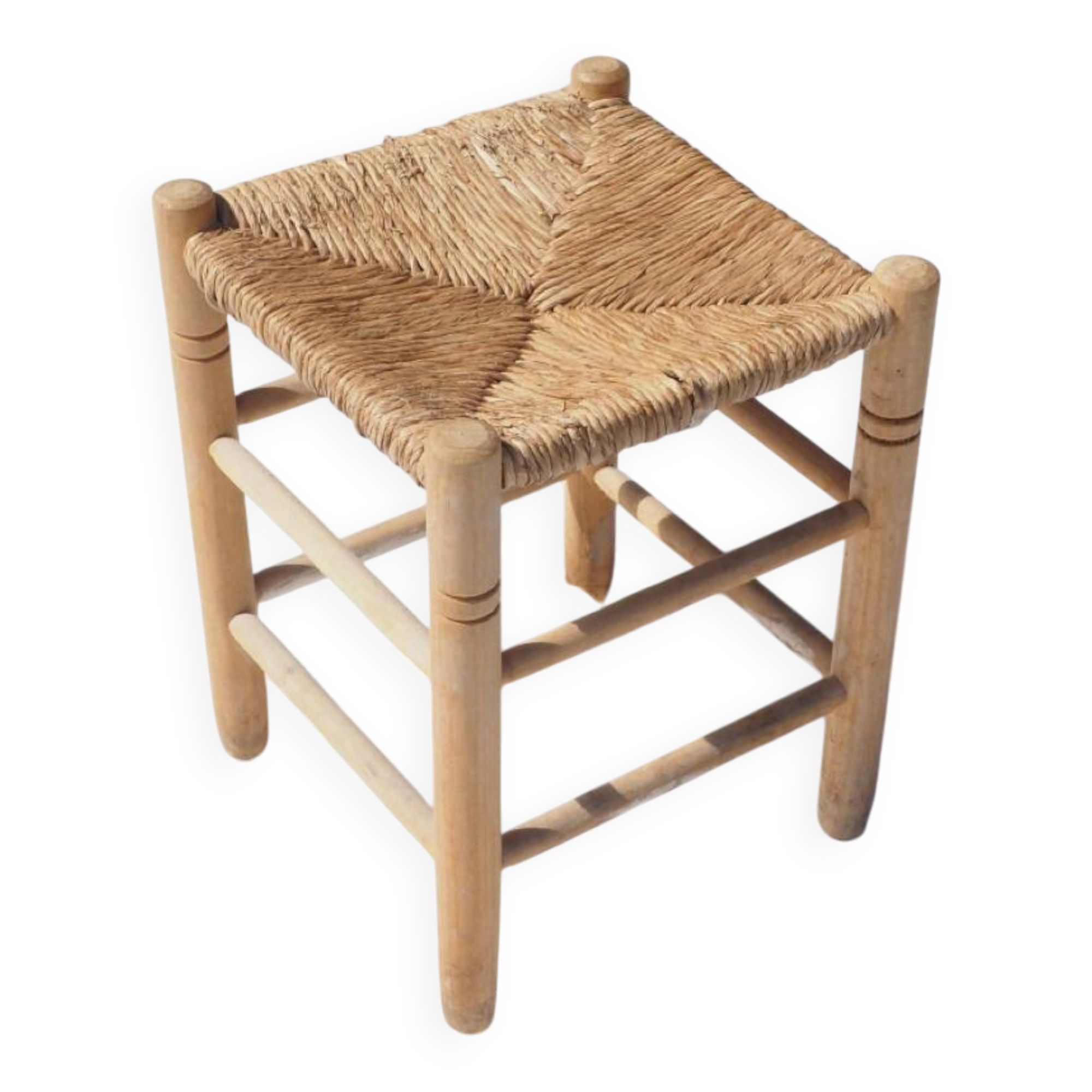 Farm stool made of wood and straw