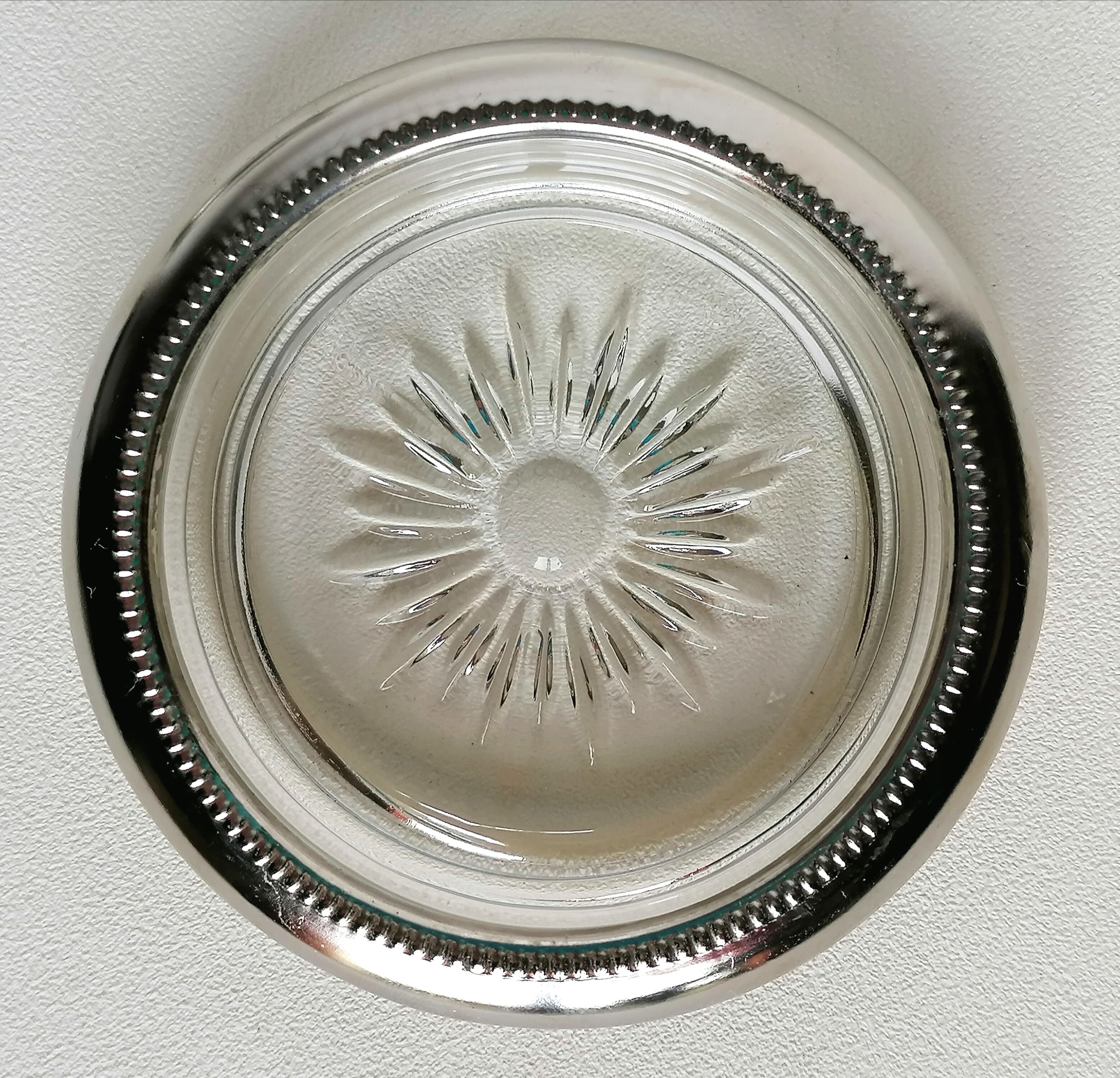 Three under silver-plated bottles