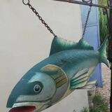 Panel depicting a fish in sheet metal