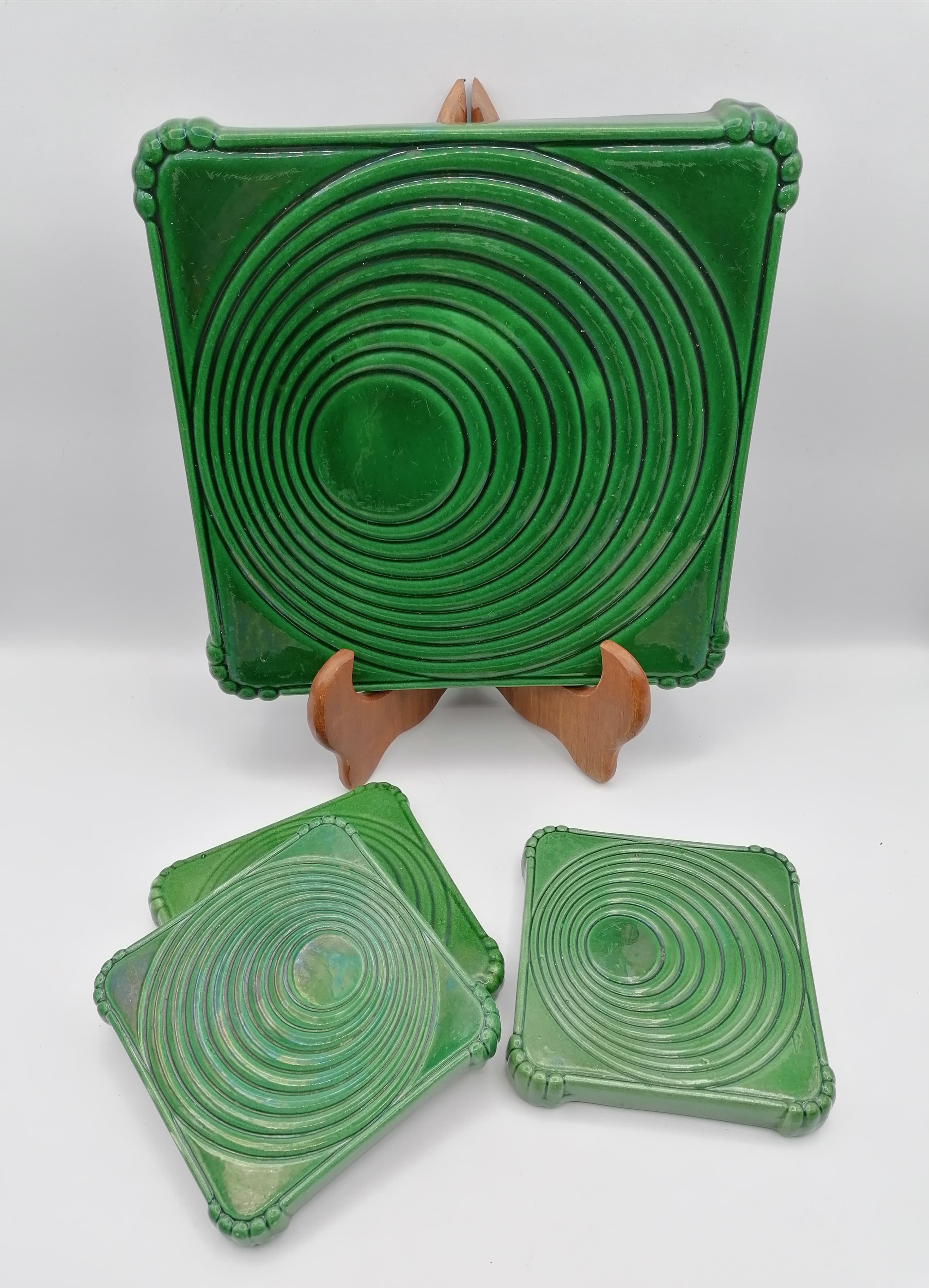 Under the plate and 3 under the bottle