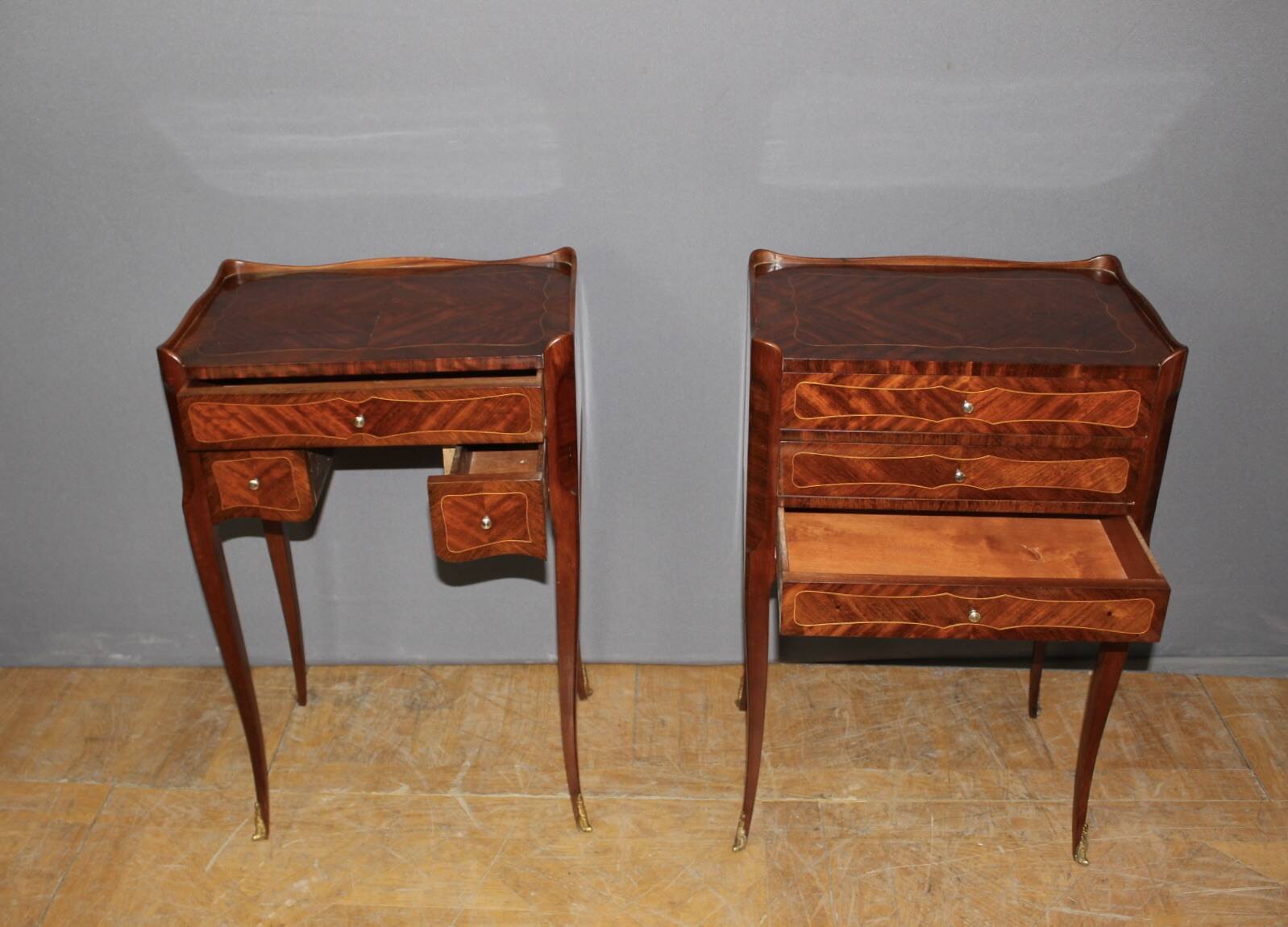 Pair of Louis XV style bedside tables in marquetry, 20th century.