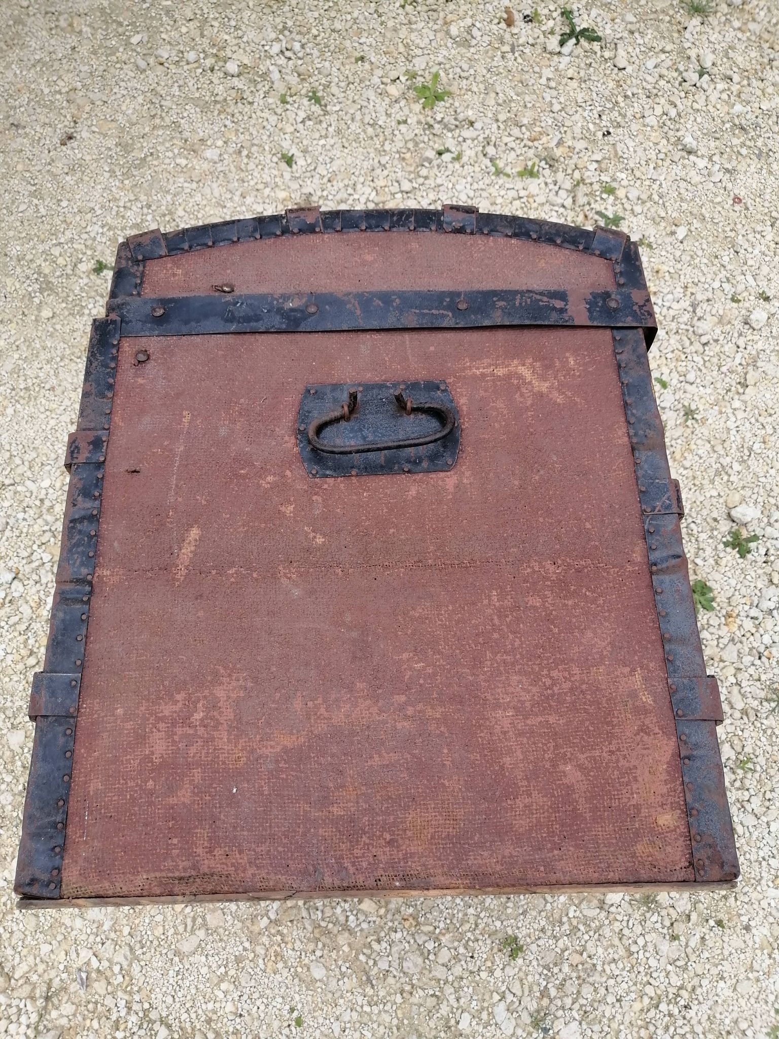 Old bombed travel trunk