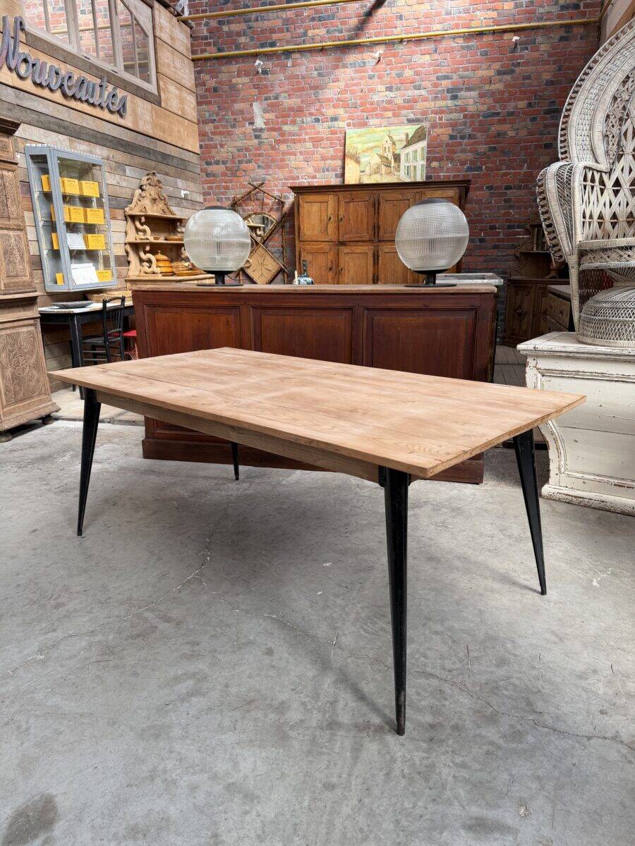 Old fir table with Tolix legs.