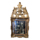 Regency period mirror with a carved and gilded wooden pediment – 18th century