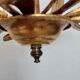 Lustre métal doré