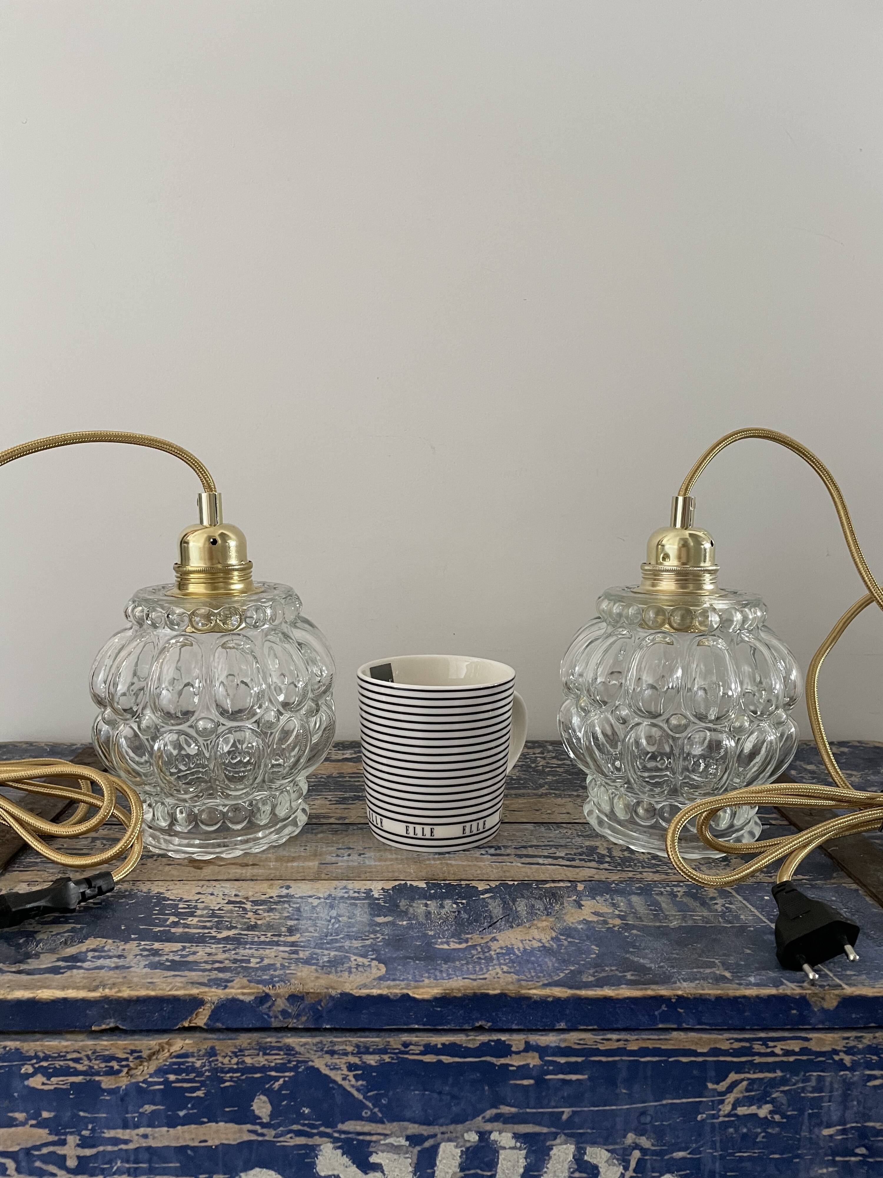 Set of two electrified chiseled glass walking lamps