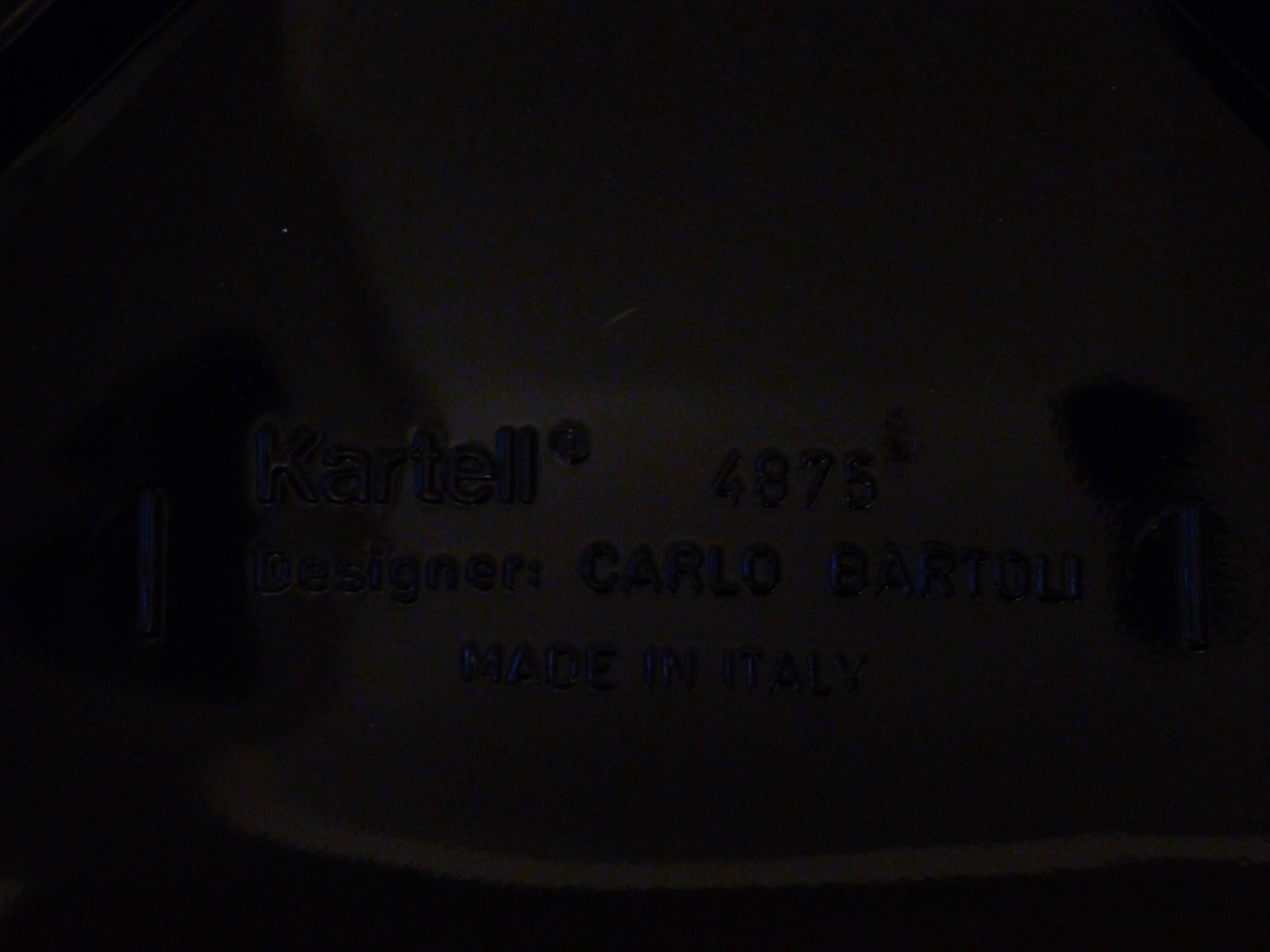 Four chairs, by Carlo Bartoli, model "4875", Kartell edition, 1970s