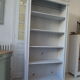 Pearl grey patinated bookcase