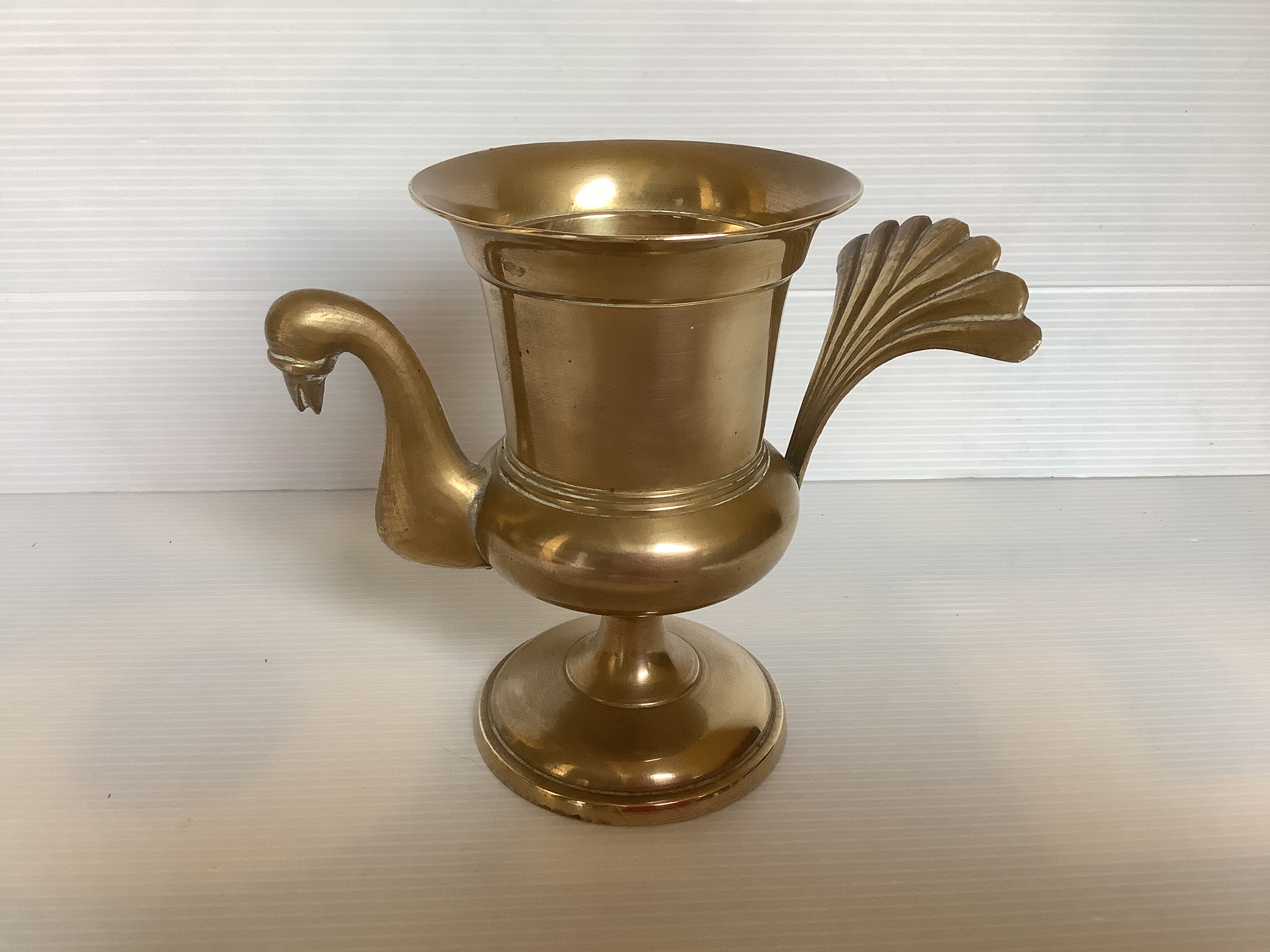 Empty brass bird pocket