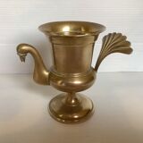 Empty brass bird pocket