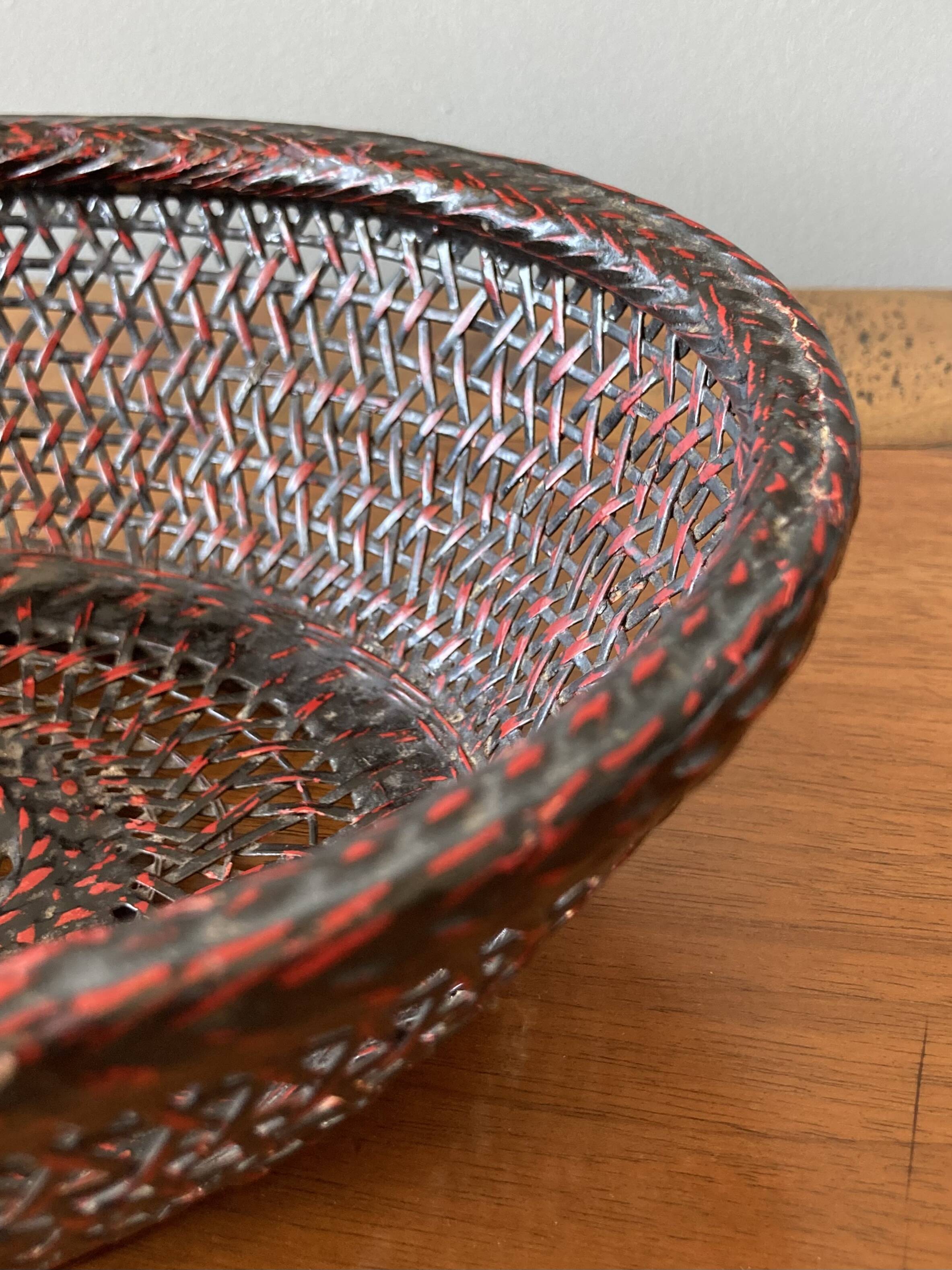Japanese oval basket in negoro lacquered basketry (red lacquer on black background)
