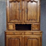 Two-body buffet from the Louis XV period in solid walnut, 18th century.