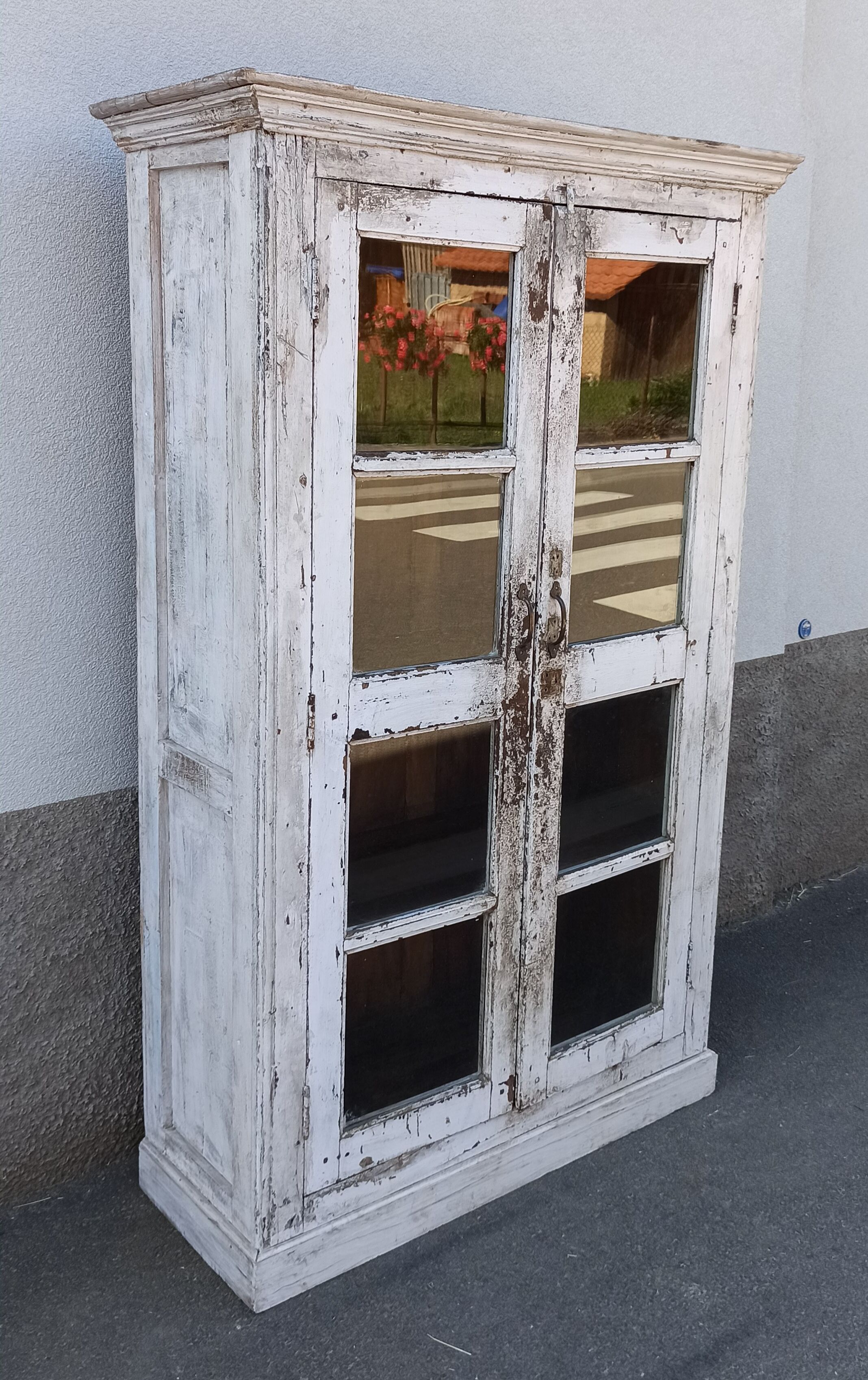 White wooden antique glazed wardrobe