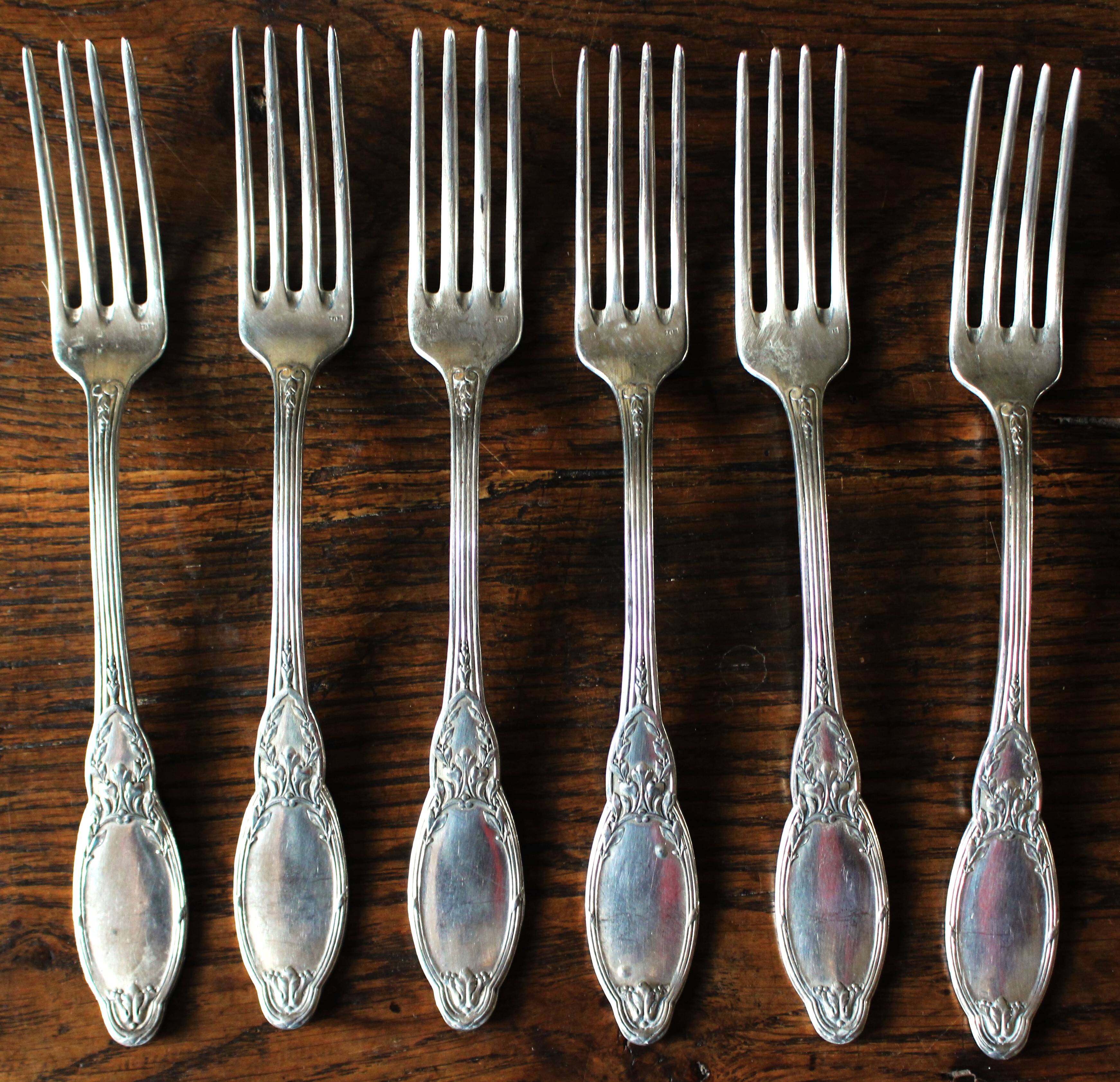 A set of 6 silver-plated foliage forks