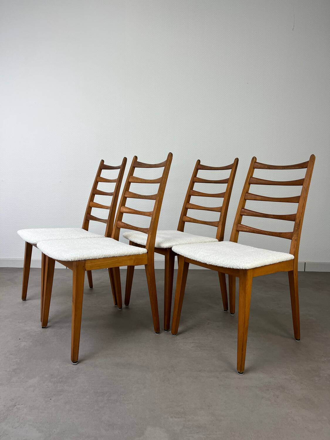 4 Scandinavian chairs, teak with boucle seats.