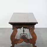 Antique 18th-century Spanish dining table with a wrought iron base