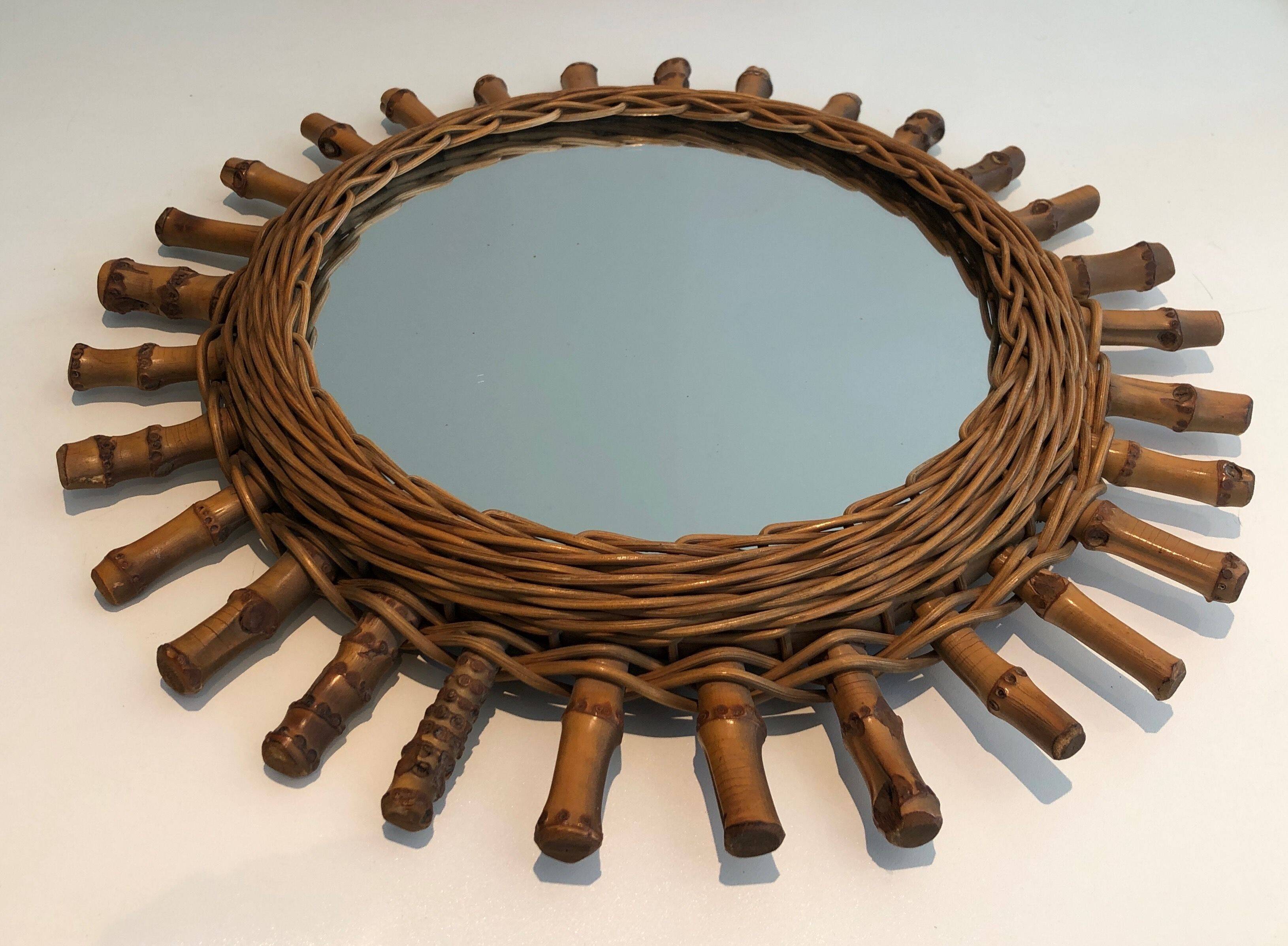 Round rattan mirror