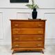 Vintage chest of drawers with compass feet