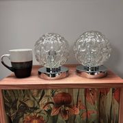 Pair of vintage glass globe chrome wall lights