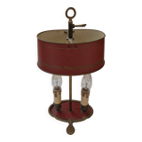 Old silver-plated bronze lamp, except for the arms which are not silver.