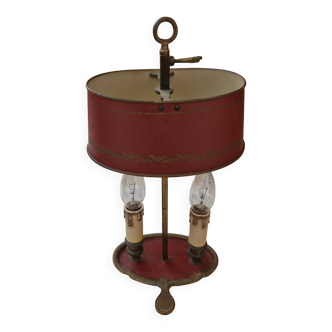 Old silver-plated bronze lamp, except for the arms which are not silver.