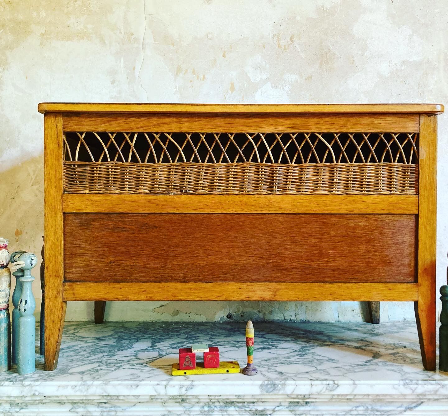 Vintage wooden and rattan toy box
