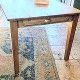 Solid oak farmhouse table with central drawer and extension