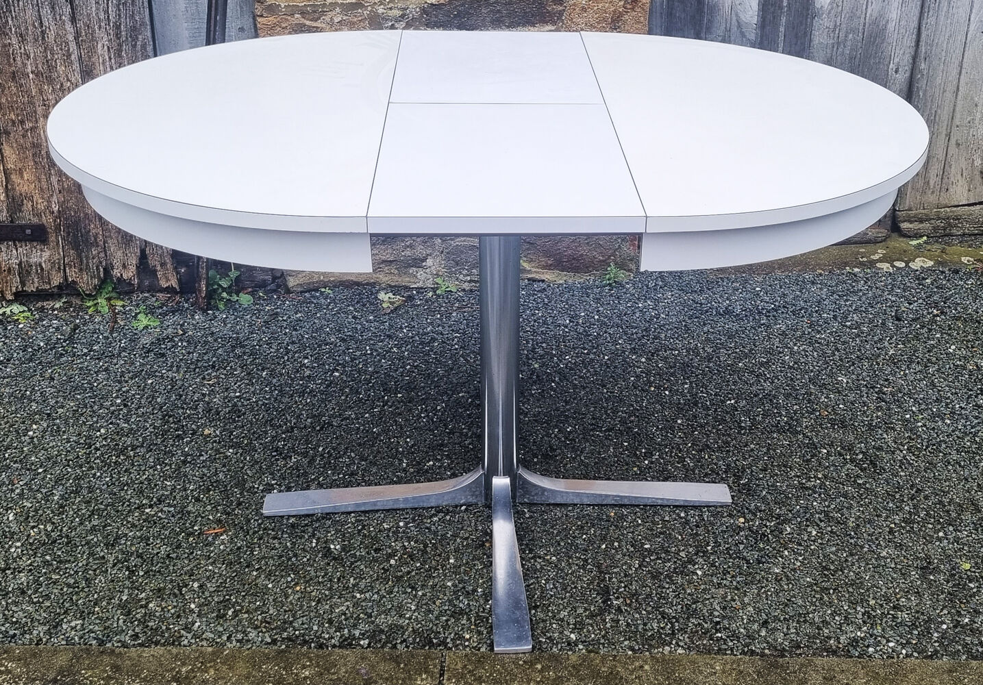 Round table in white formica, retractable, vintage, Collomb creation, 70s